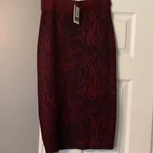 Express x Negin Mirsalehi body con midi skirt. Elastic sweater material. Small